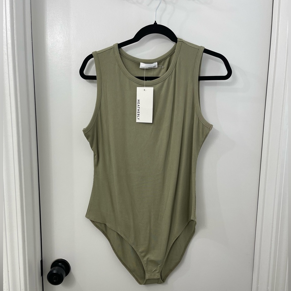 Olive Green Sleeveless Bodysuit
The brand is not Artizia.